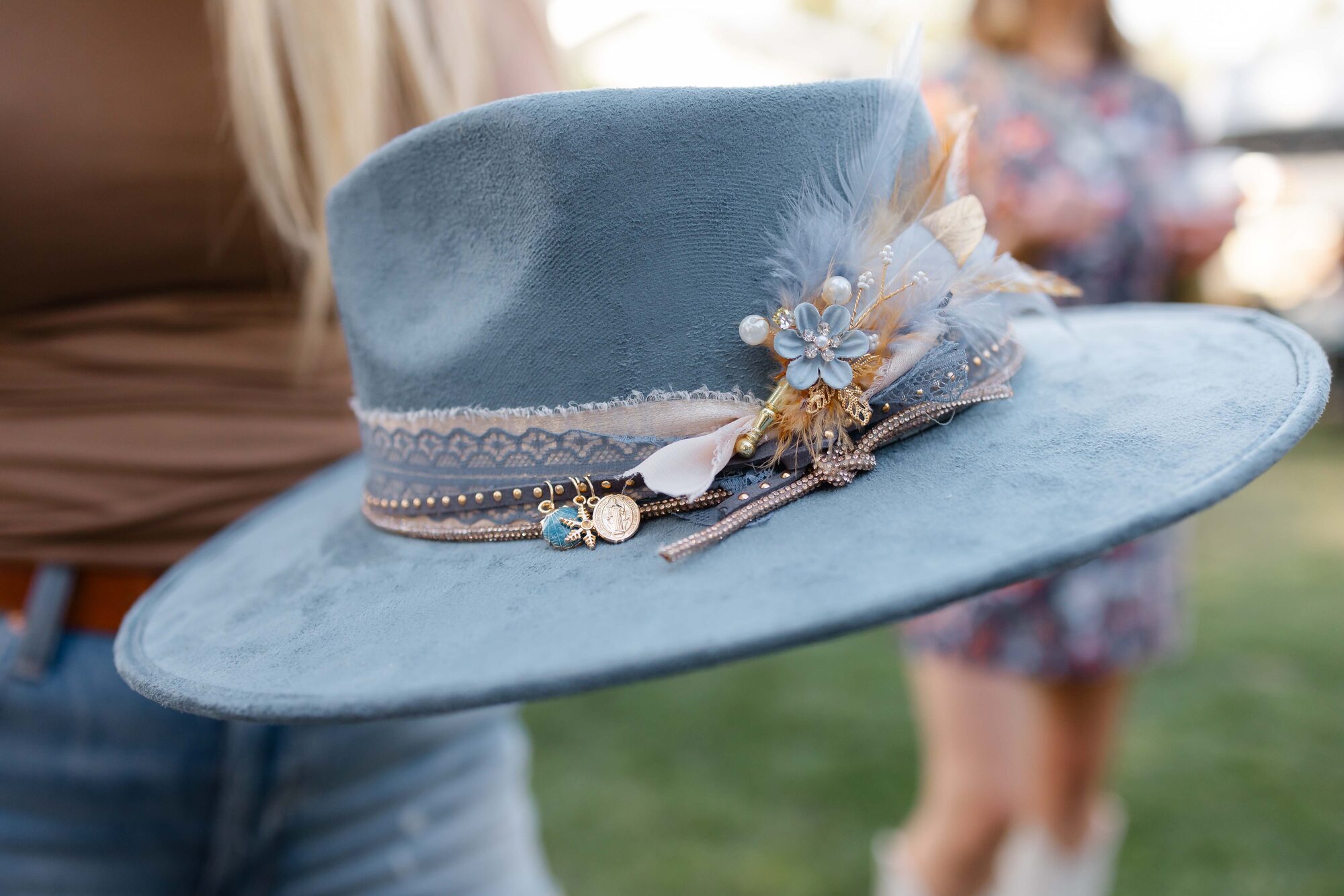 Close up of luxury hat band accessories and charms