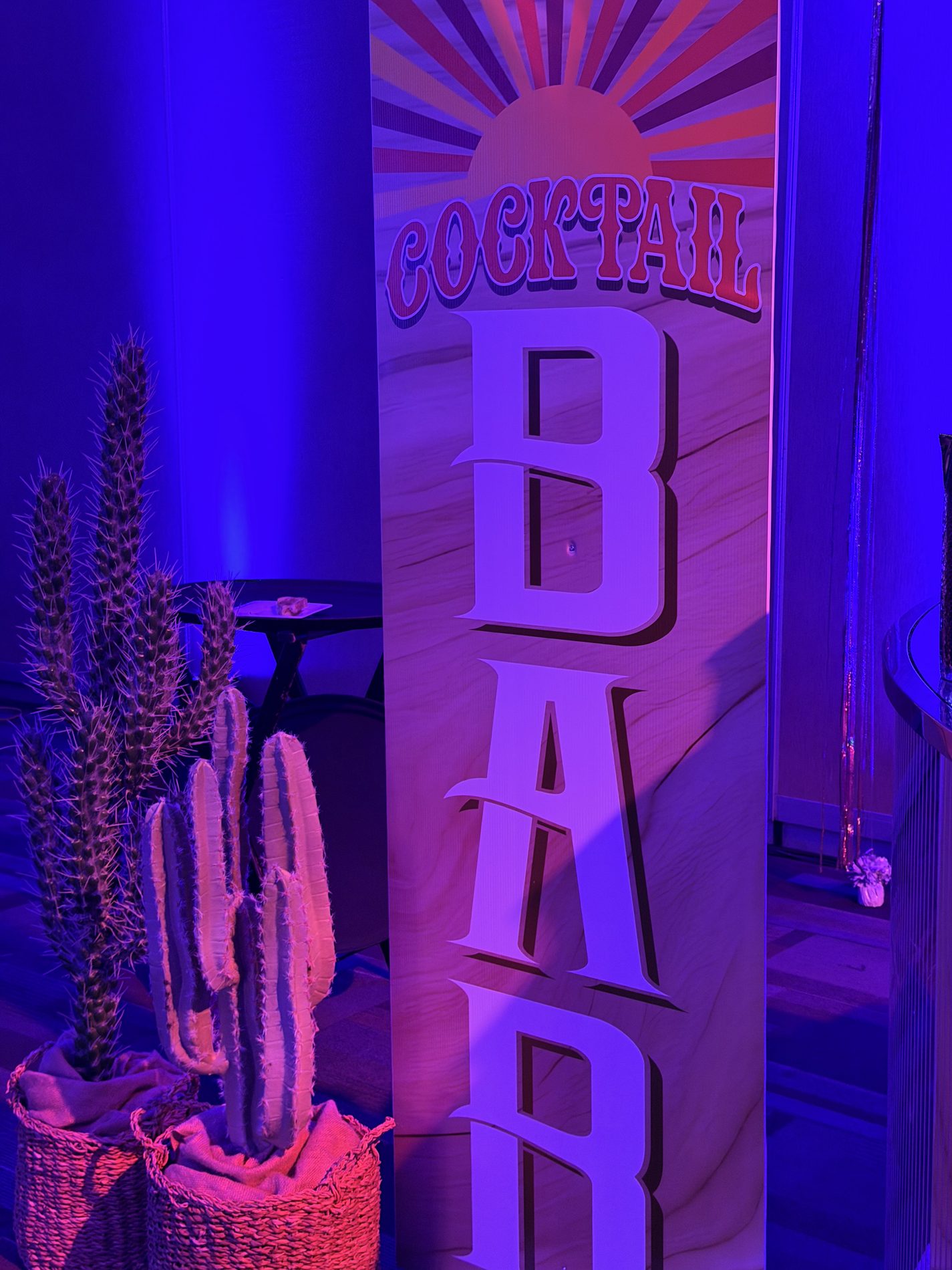 Saddle N Spurs hat bar booth on the convention floor in Vancouver, BC