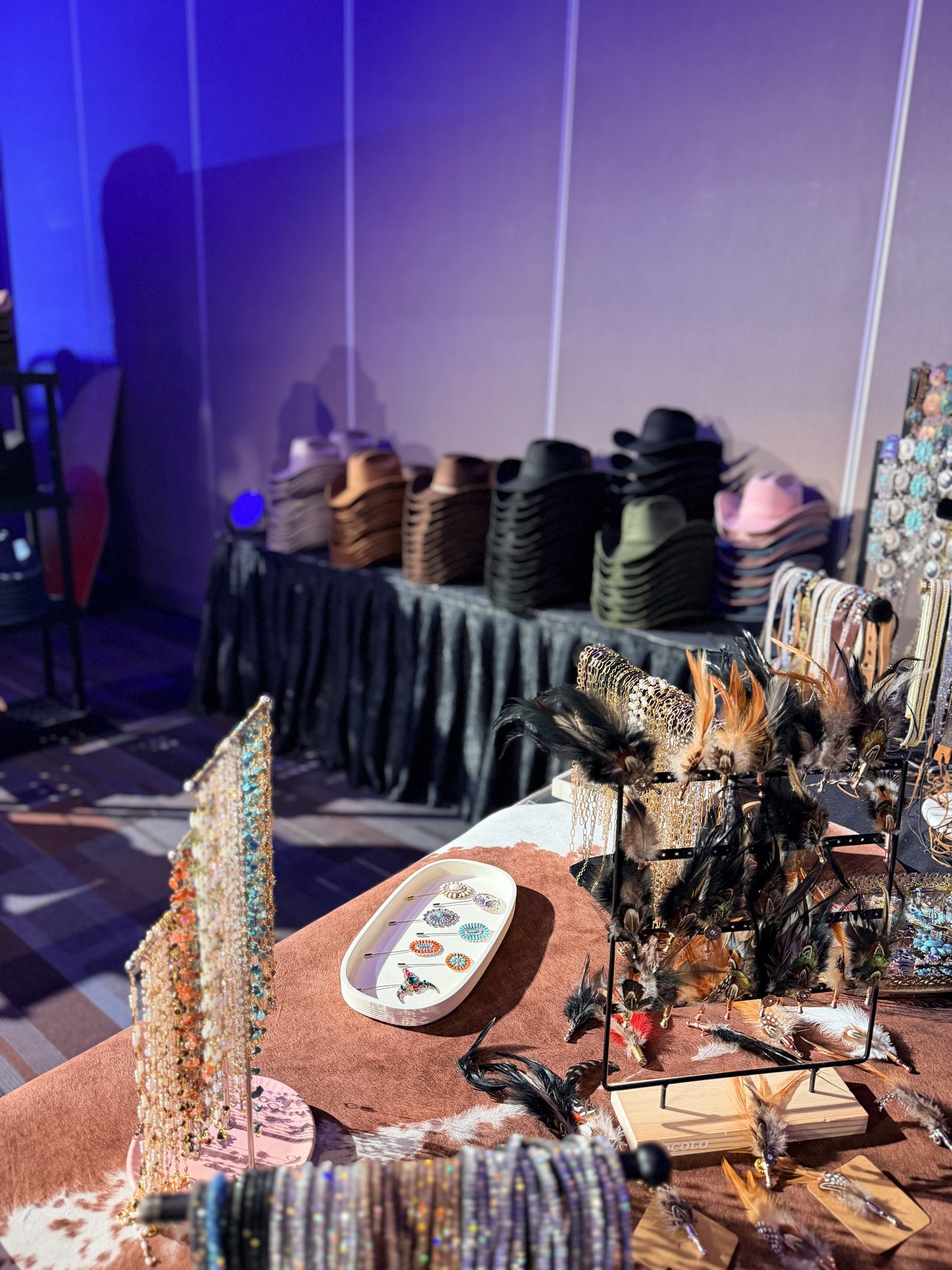Live branding a hat at a Saddle N Spurs corporate event