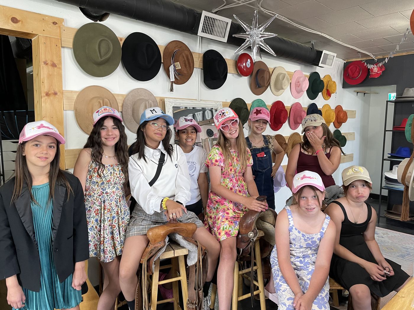 Group of kids wearing custom styled hats at a Saddle N Spurs birthday party in Kamloops