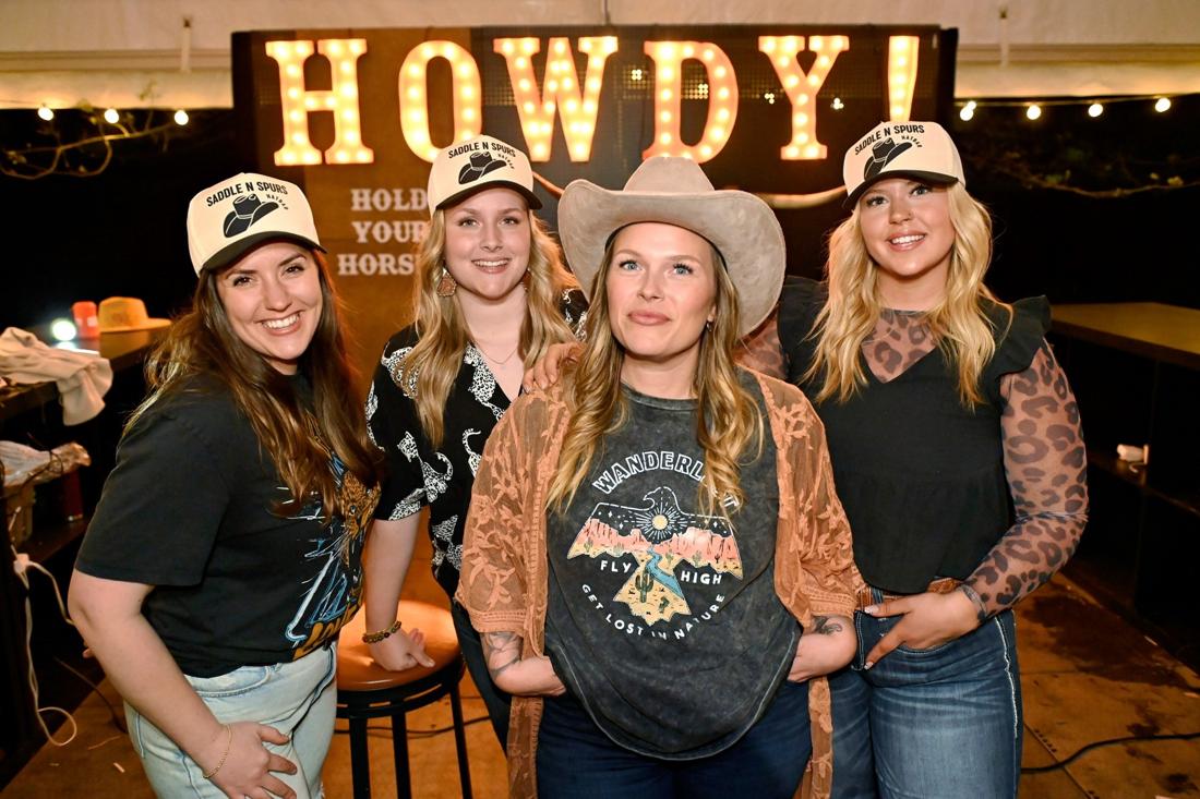 The Saddle N Spurs team at an evening event