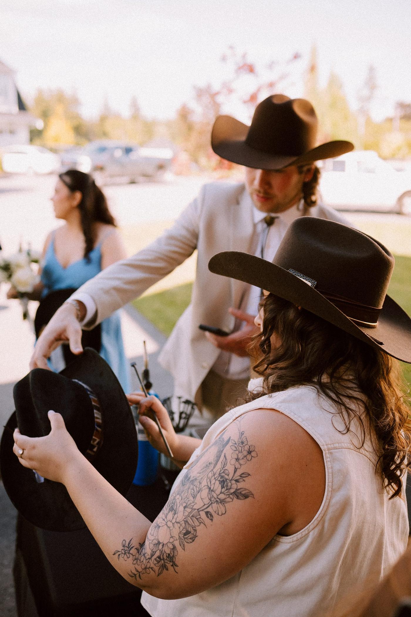 Close-up detail of a finished hat with lace and ribbon at the Cave Creek Ranch wedding