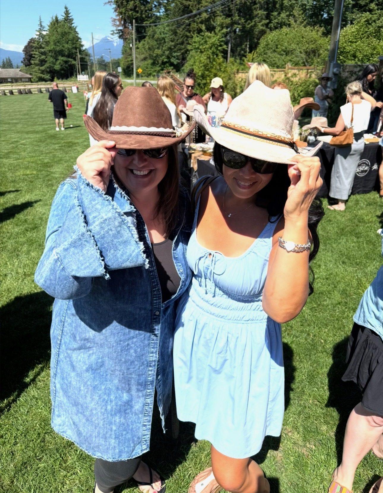 Guest wearing a finished custom hat at the Roots and Wings Distillery pop-up