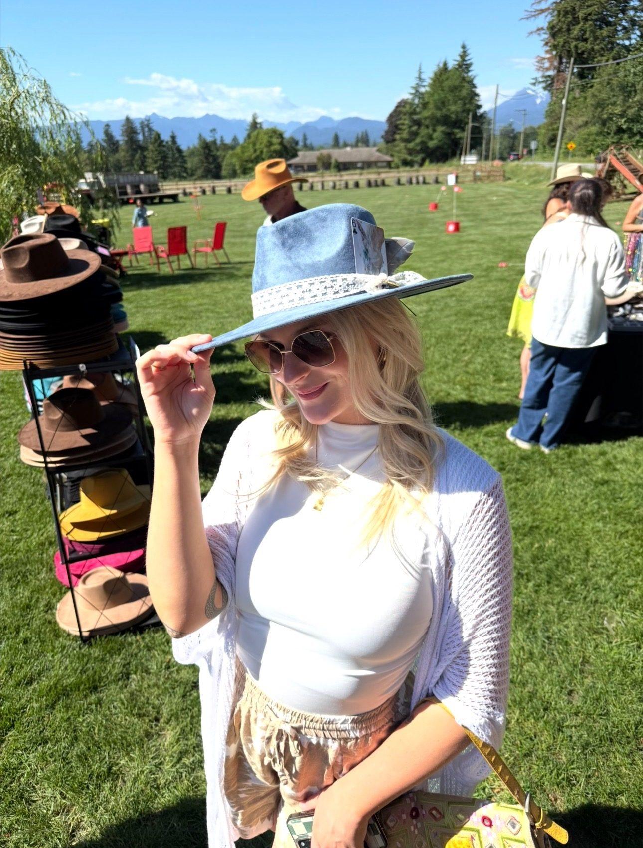 Guest styling their hat at the Roots and Wings Distillery pop-up