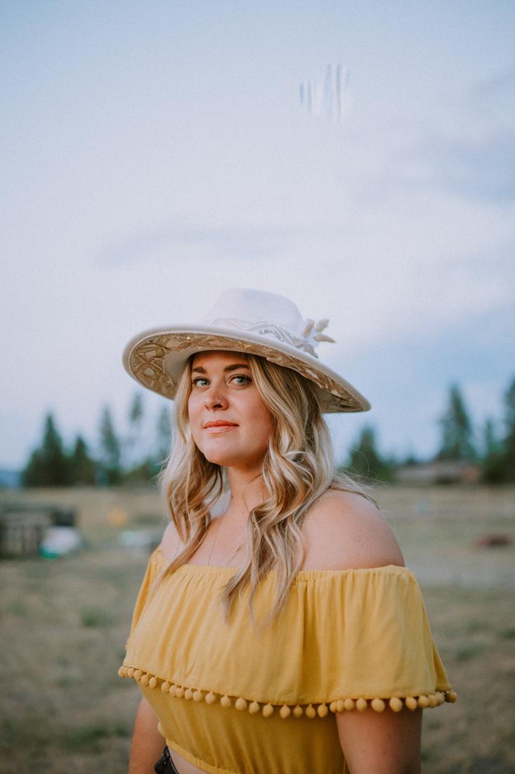 Guest wearing her finished custom hat outdoors